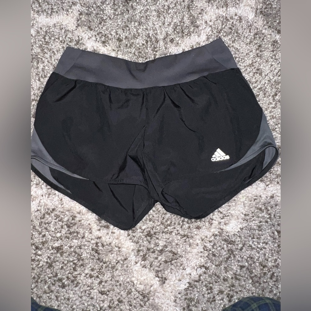 black and grey adidas running shorts